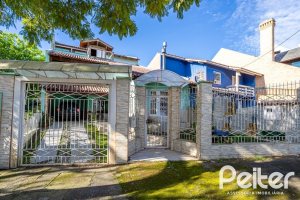 Casa à venda com 407m², 3 dormitórios, 2 suítes, 4 vagas, no bairro Ipanema em Porto Alegre