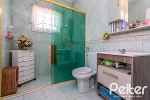 Casa à venda com 407m², 3 dormitórios, 2 suítes, 4 vagas, no bairro Ipanema em Porto Alegre