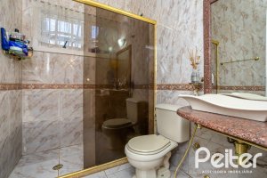 Casa à venda com 407m², 3 dormitórios, 2 suítes, 4 vagas, no bairro Ipanema em Porto Alegre