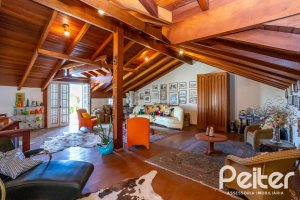 Casa à venda com 407m², 3 dormitórios, 2 suítes, 4 vagas, no bairro Ipanema em Porto Alegre