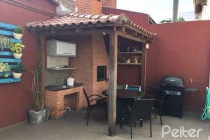 Casa em Condomínio à venda com 270m², 3 dormitórios, 1 suíte, 3 vagas, no bairro Tristeza em Porto Alegre