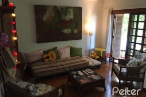 Casa em Condomínio à venda com 270m², 3 dormitórios, 1 suíte, 3 vagas, no bairro Tristeza em Porto Alegre