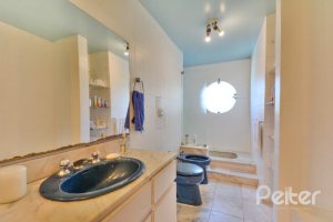 Casa à venda com 442m², 6 dormitórios, 3 suítes, 3 vagas, no bairro Vila Assunção em Porto Alegre