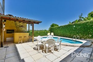 Casa à venda com 442m², 6 dormitórios, 3 suítes, 3 vagas, no bairro Vila Assunção em Porto Alegre