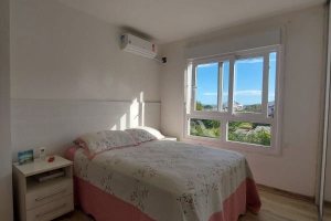 Casa em Condomínio à venda com 130m², 3 dormitórios, 1 suíte, 2 vagas, no bairro Ipanema em Porto Alegre