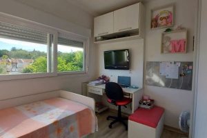 Casa em Condomínio à venda com 130m², 3 dormitórios, 1 suíte, 2 vagas, no bairro Ipanema em Porto Alegre