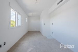 Casa em Condomínio à venda com 233m², 3 dormitórios, 1 suíte, 3 vagas, no bairro Vila Assunção em Porto Alegre