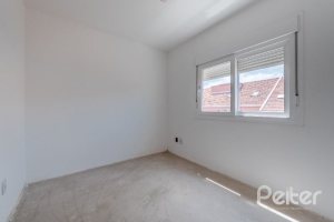 Casa em Condomínio à venda com 233m², 3 dormitórios, 1 suíte, 3 vagas, no bairro Vila Assunção em Porto Alegre