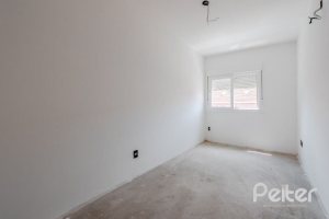 Casa em Condomínio à venda com 233m², 3 dormitórios, 1 suíte, 3 vagas, no bairro Vila Assunção em Porto Alegre