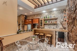 Casa em Condomínio à venda com 300m², 4 dormitórios, 1 suíte, 2 vagas, no bairro Nonoai em Porto Alegre