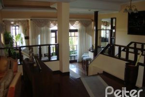 Casa em Condomínio à venda com 300m², 4 dormitórios, 1 suíte, 2 vagas, no bairro Nonoai em Porto Alegre