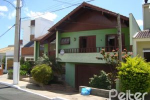 Casa em Condomínio à venda com 300m², 4 dormitórios, 1 suíte, 2 vagas, no bairro Nonoai em Porto Alegre