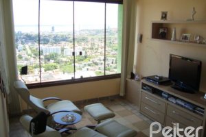 Casa em Condomínio à venda com 300m², 4 dormitórios, 1 suíte, 2 vagas, no bairro Nonoai em Porto Alegre