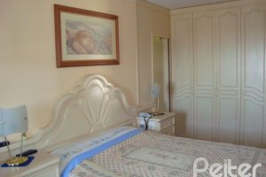 Casa em Condomínio à venda com 300m², 4 dormitórios, 1 suíte, 2 vagas, no bairro Nonoai em Porto Alegre