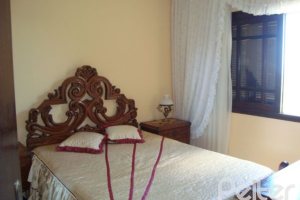 Casa em Condomínio à venda com 300m², 4 dormitórios, 1 suíte, 2 vagas, no bairro Nonoai em Porto Alegre