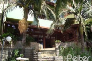 Casa em Condomínio à venda com 300m², 4 dormitórios, 1 suíte, 2 vagas, no bairro Nonoai em Porto Alegre