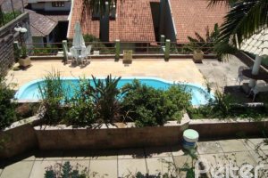 Casa em Condomínio à venda com 300m², 4 dormitórios, 1 suíte, 2 vagas, no bairro Nonoai em Porto Alegre