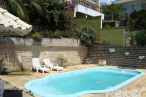 Casa em Condomínio à venda com 300m², 4 dormitórios, 1 suíte, 2 vagas, no bairro Nonoai em Porto Alegre