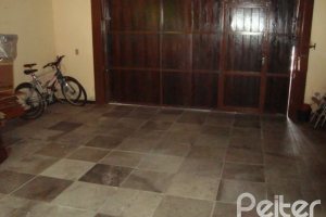 Casa em Condomínio à venda com 300m², 4 dormitórios, 1 suíte, 2 vagas, no bairro Nonoai em Porto Alegre