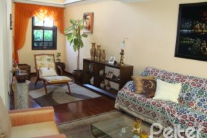 Casa em Condomínio à venda com 300m², 4 dormitórios, 1 suíte, 2 vagas, no bairro Nonoai em Porto Alegre