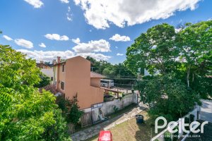 Casa em Condomínio à venda com 163m², 3 dormitórios, 1 suíte, 2 vagas, no bairro Ipanema em Porto Alegre