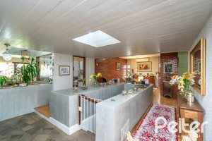 Casa à venda com 405m², 3 dormitórios, 3 suítes, 6 vagas, no bairro Vila Assunção em Porto Alegre