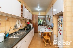 Casa à venda com 405m², 3 dormitórios, 3 suítes, 6 vagas, no bairro Vila Assunção em Porto Alegre