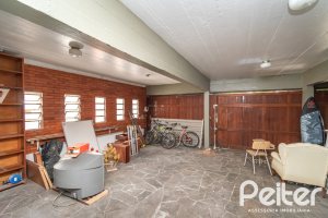 Casa à venda com 405m², 3 dormitórios, 3 suítes, 6 vagas, no bairro Vila Assunção em Porto Alegre