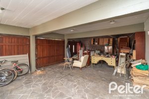 Casa à venda com 405m², 3 dormitórios, 3 suítes, 6 vagas, no bairro Vila Assunção em Porto Alegre