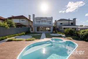 Casa em Condomínio à venda com 299m², 5 dormitórios, 5 suítes, 4 vagas, no bairro Terra Ville em PORTO ALEGRE