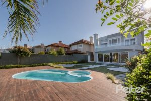 Casa em Condomínio à venda com 299m², 5 dormitórios, 5 suítes, 4 vagas, no bairro Terra Ville em PORTO ALEGRE