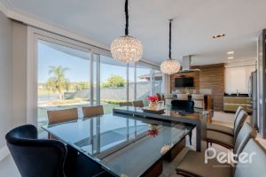 Casa em Condomínio à venda com 299m², 5 dormitórios, 5 suítes, 4 vagas, no bairro Terra Ville em PORTO ALEGRE