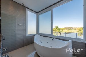 Casa em Condomínio à venda com 299m², 5 dormitórios, 5 suítes, 4 vagas, no bairro Terra Ville em PORTO ALEGRE