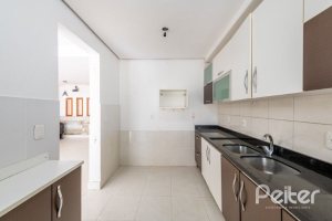 Casa à venda com 233m², 4 dormitórios, 1 suíte, 2 vagas, no bairro Tristeza em Porto Alegre