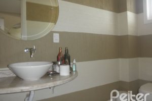 Casa à venda com 445m², 4 dormitórios, 2 suítes, 2 vagas, no bairro Ipanema em Porto Alegre