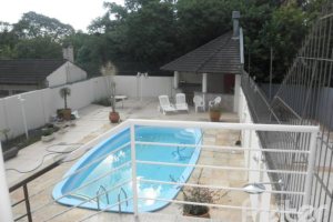 Casa à venda com 445m², 4 dormitórios, 2 suítes, 2 vagas, no bairro Ipanema em Porto Alegre