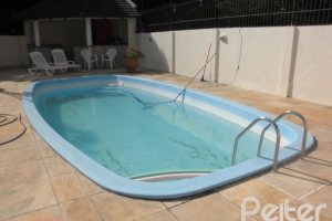 Casa à venda com 445m², 4 dormitórios, 2 suítes, 2 vagas, no bairro Ipanema em Porto Alegre