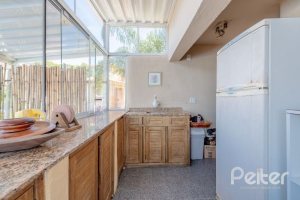 Casa à venda com 442m², 3 dormitórios, 1 suíte, 4 vagas, no bairro Vila Conceição em Porto Alegre