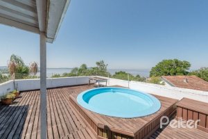 Casa à venda com 442m², 3 dormitórios, 1 suíte, 4 vagas, no bairro Vila Conceição em Porto Alegre