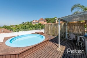 Casa à venda com 442m², 3 dormitórios, 1 suíte, 4 vagas, no bairro Vila Conceição em Porto Alegre