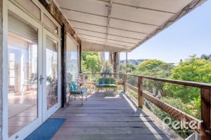 Casa à venda com 442m², 3 dormitórios, 1 suíte, 4 vagas, no bairro Vila Conceição em Porto Alegre