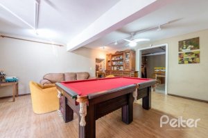 Casa à venda com 442m², 3 dormitórios, 1 suíte, 4 vagas, no bairro Vila Conceição em Porto Alegre