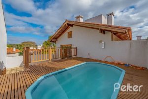 Casa em Condomínio à venda com 334m², 4 dormitórios, 1 suíte, 2 vagas, no bairro Jardim Isabel em Porto Alegre