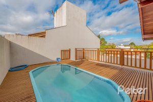 Casa em Condomínio à venda com 334m², 4 dormitórios, 1 suíte, 2 vagas, no bairro Jardim Isabel em Porto Alegre