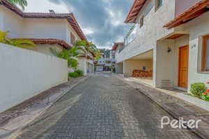 Casa em Condomínio à venda com 334m², 4 dormitórios, 1 suíte, 2 vagas, no bairro Jardim Isabel em Porto Alegre