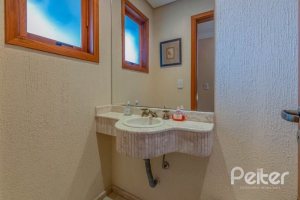 Casa em Condomínio à venda com 334m², 4 dormitórios, 1 suíte, 2 vagas, no bairro Jardim Isabel em Porto Alegre