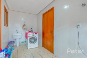 Casa em Condomínio à venda com 334m², 4 dormitórios, 1 suíte, 2 vagas, no bairro Jardim Isabel em Porto Alegre