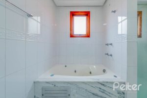 Casa em Condomínio à venda com 334m², 4 dormitórios, 1 suíte, 2 vagas, no bairro Jardim Isabel em Porto Alegre