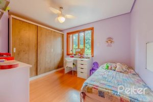 Casa em Condomínio à venda com 334m², 4 dormitórios, 1 suíte, 2 vagas, no bairro Jardim Isabel em Porto Alegre