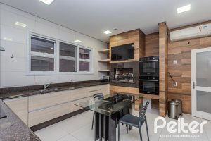 Casa em Condomínio à venda com 503m², 4 dormitórios, 4 suítes, 4 vagas, no bairro Terra Ville em PORTO ALEGRE